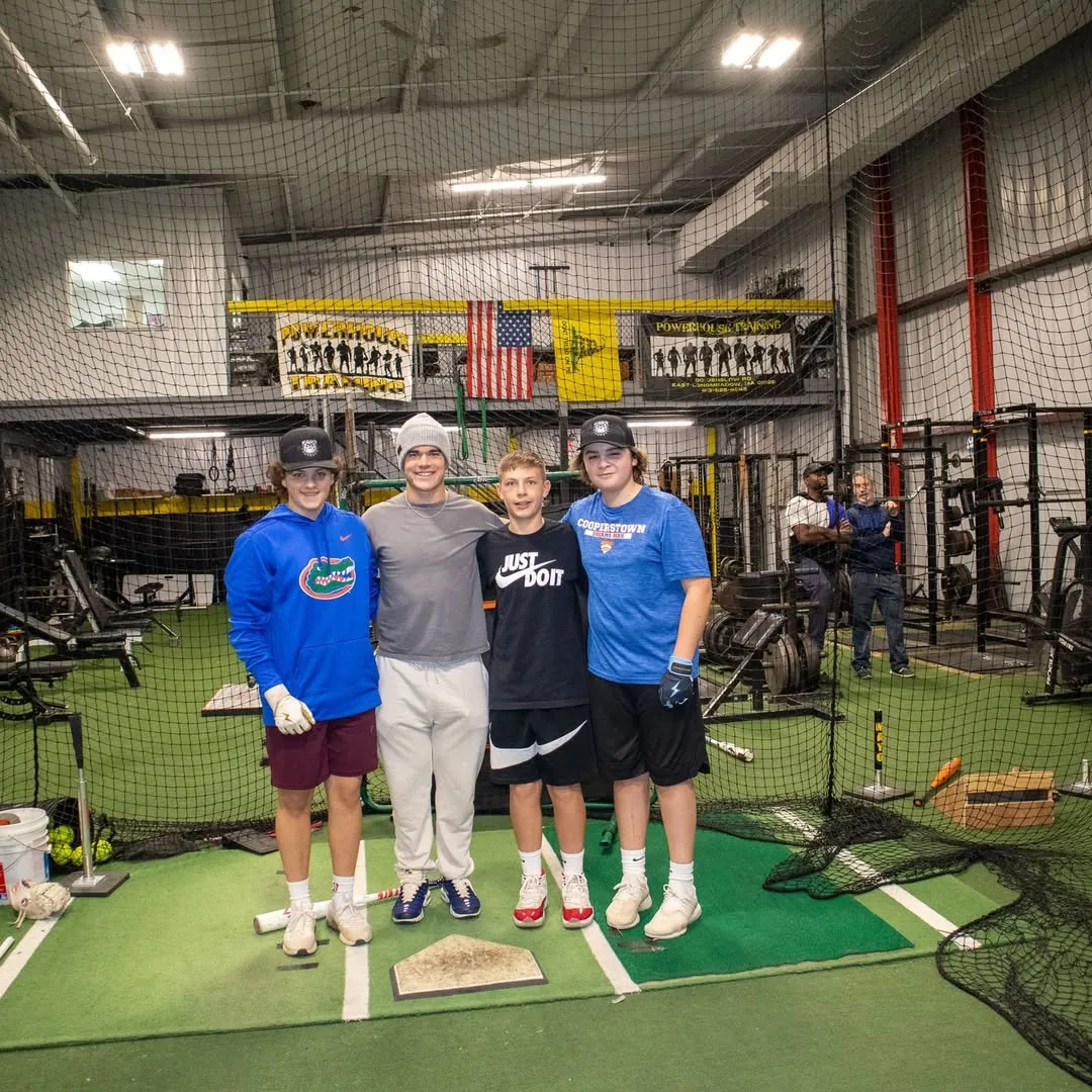 Powerhouse Training athletes and coaches under the facility banner